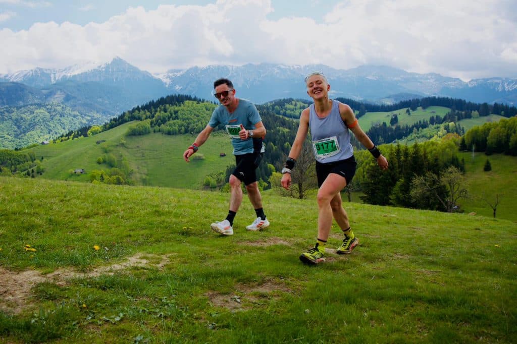 Two runners on the Loop 2 meadow